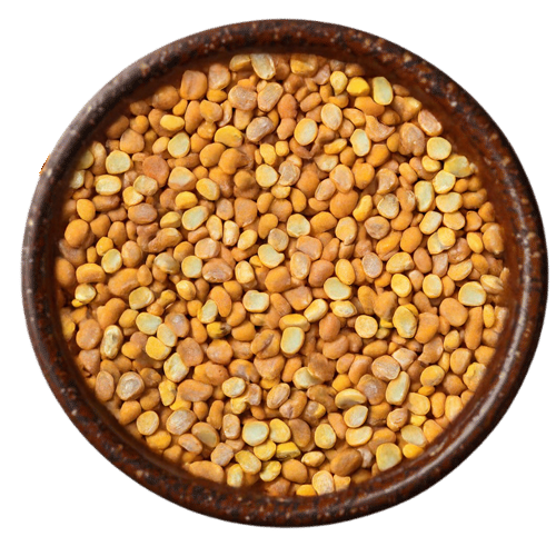 Vedafox premium moong dal in wooden bowl, showing uniform yellow split green gram with smooth texture and processing-ready quality.